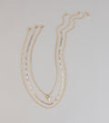 Subtle Bite Tooth Charm Three Pack Necklace Set